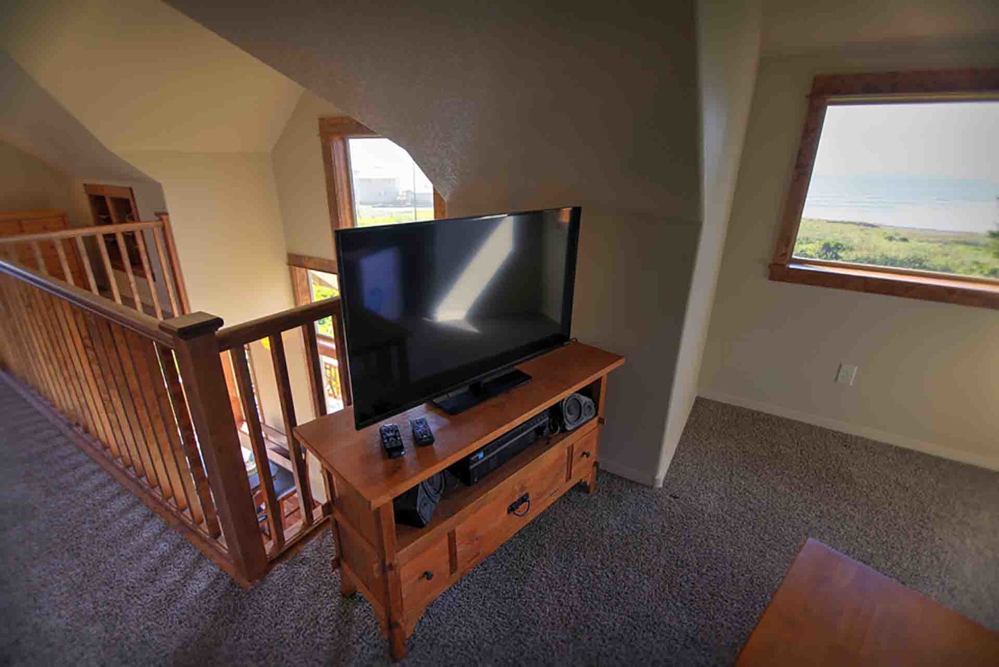 Watch cable television in the loft.