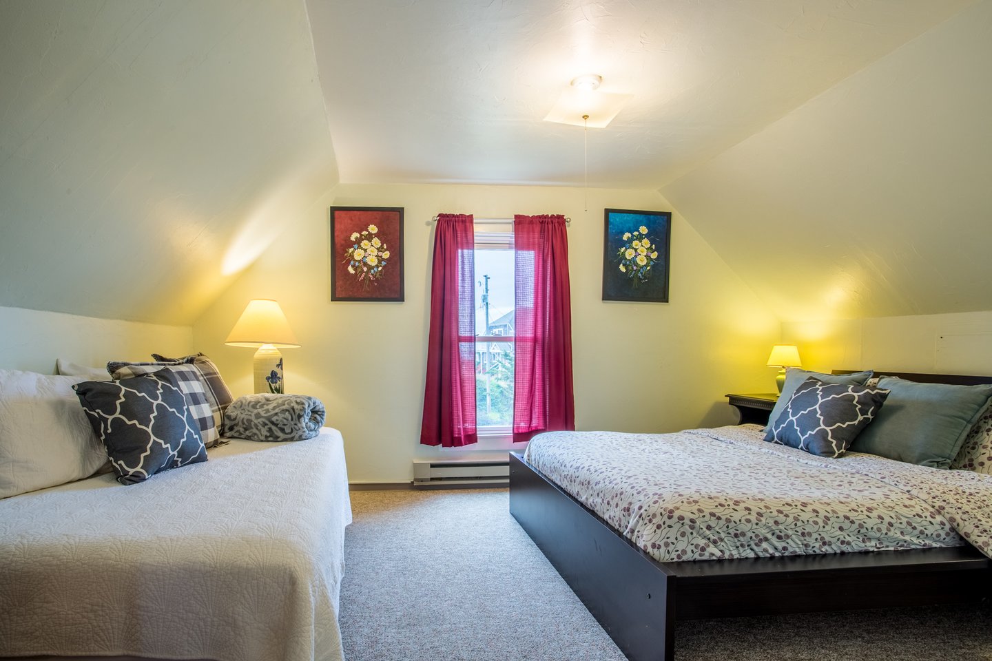 Another bedroom with a queen bed and a twin bed.