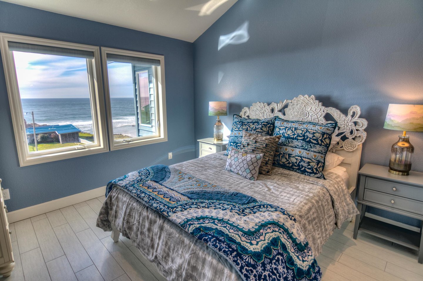 Upstairs bedroom with a beautiful queen bed.