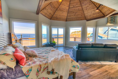 Wood paneled vaulted ceiling adds to the spaciousness of this studio.