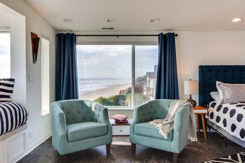 Panoramic views can be enjoyed from the primary bedroom