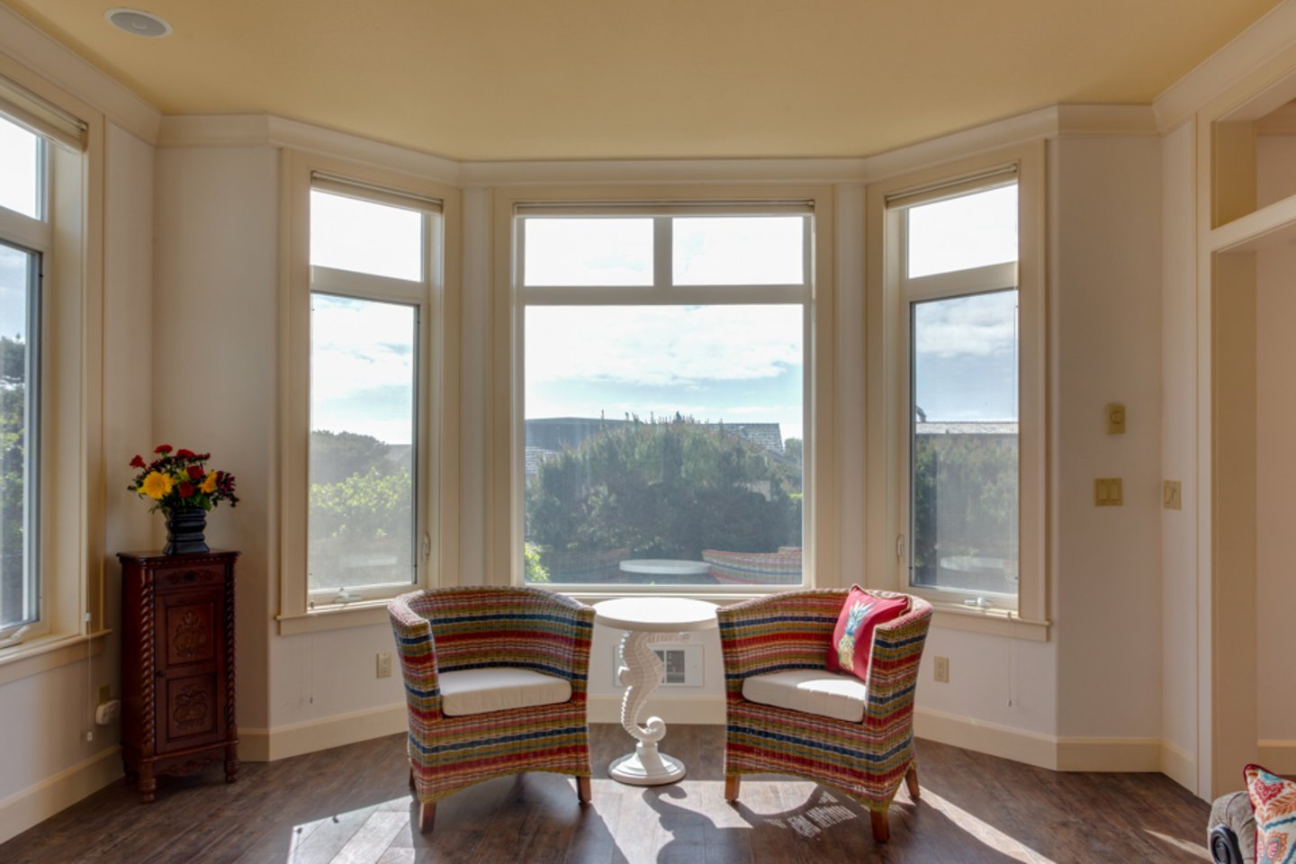 Enjoy the sunshine and a favorite drink while sitting at the living room bay window.