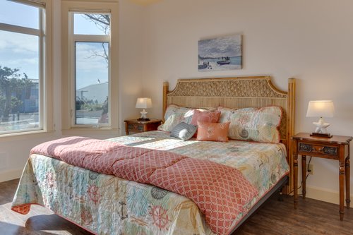 The bright and airy downstairs king bed is a wonderful retreat.