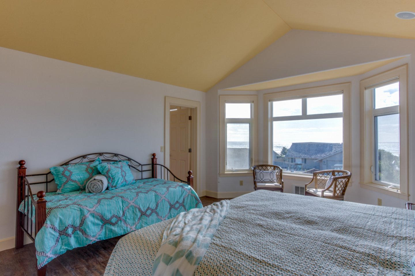 Added sleeping space is available with the daybed in the bedroom.