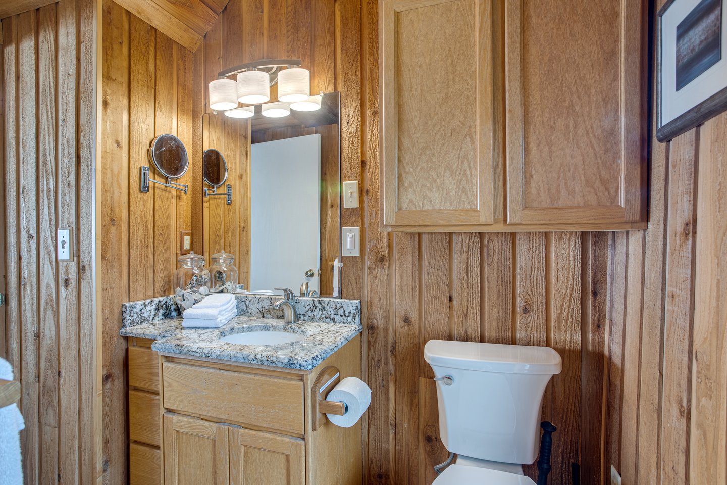 The bathroom upstairs is shared by both bedrooms.