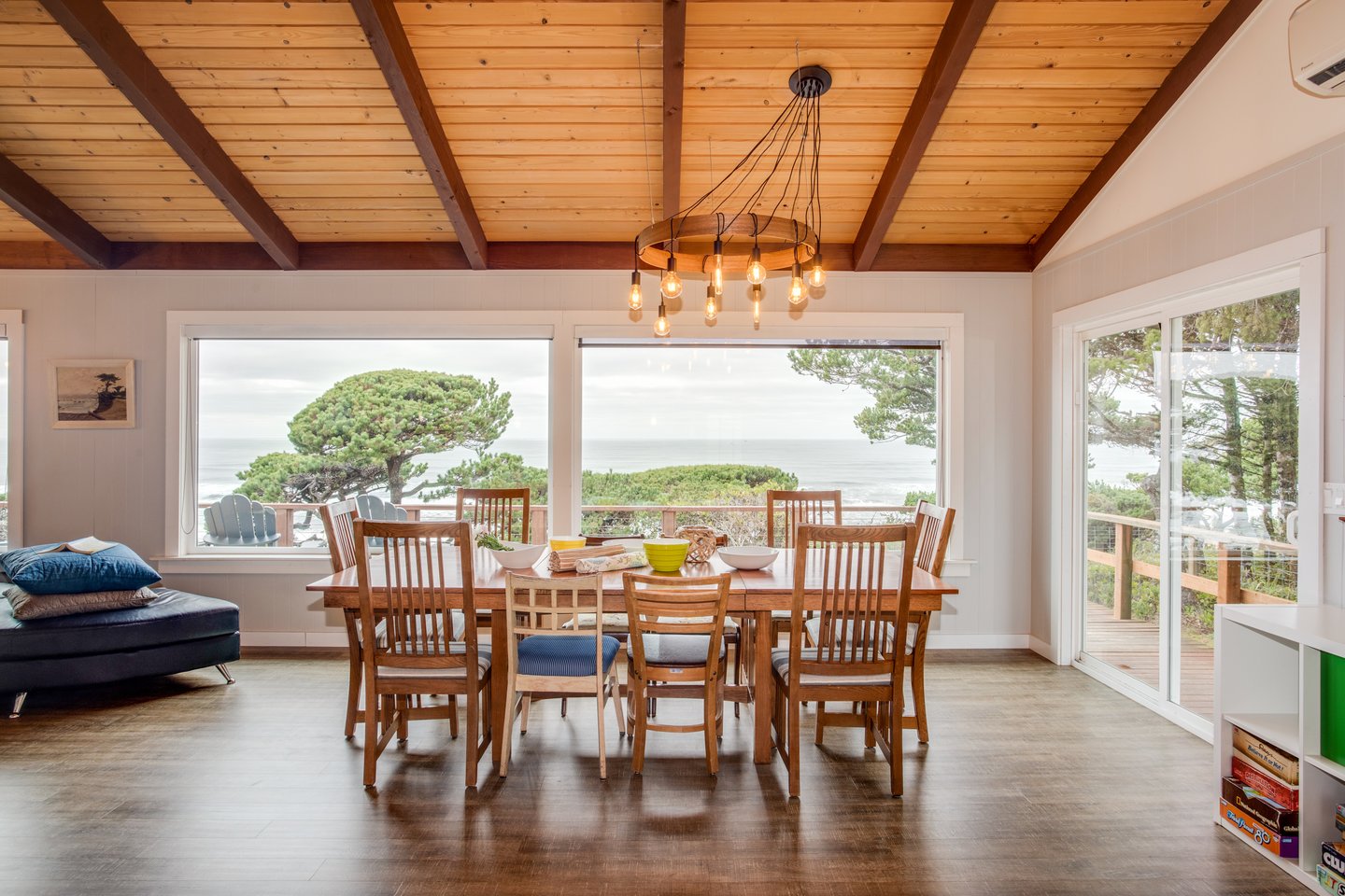 Dine with a view of the ocean under a custom made chandelier.