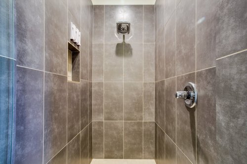 Beautiful tiled walk in shower.