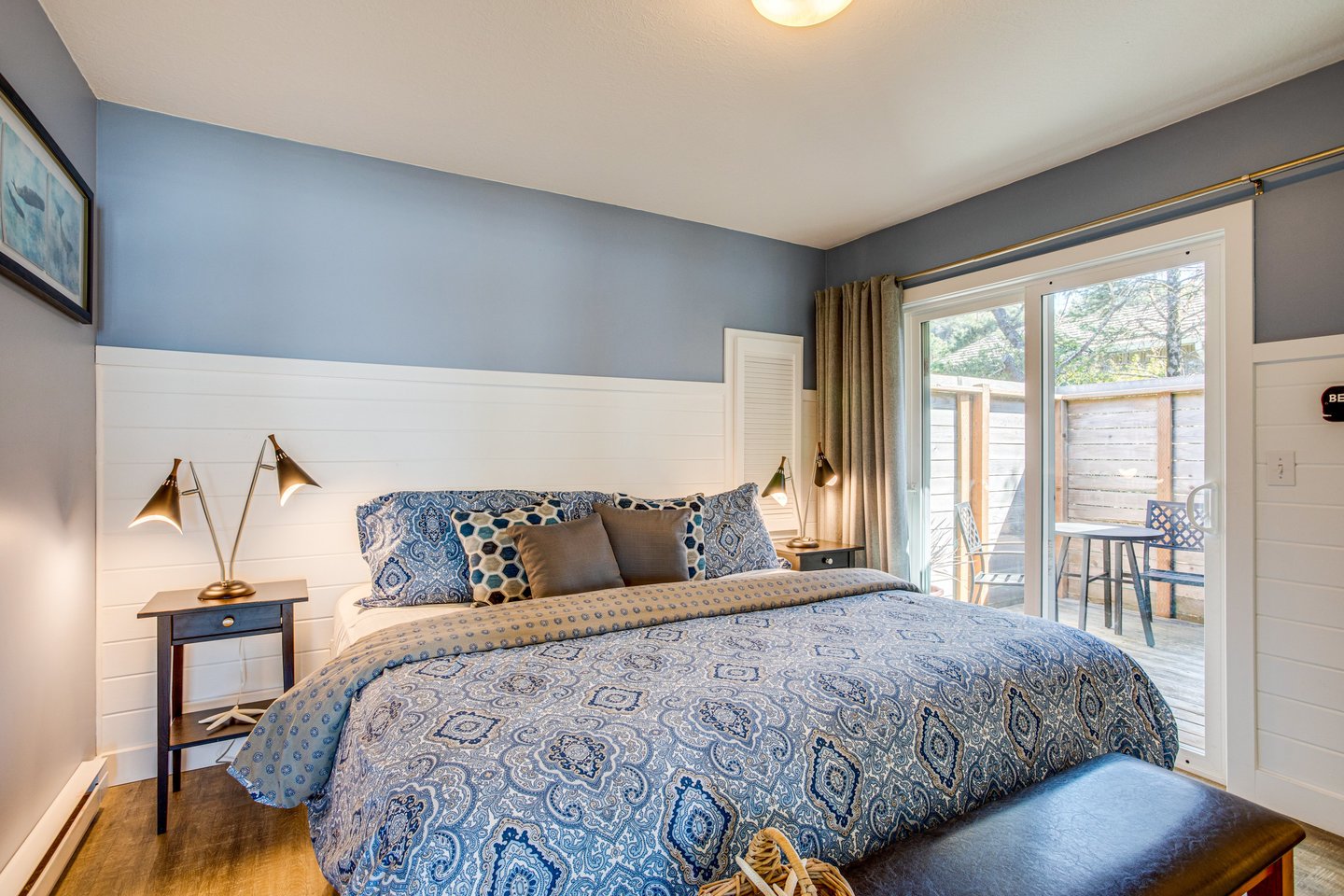 Relax in your cozy master bedroom after a day of exploring the coast.