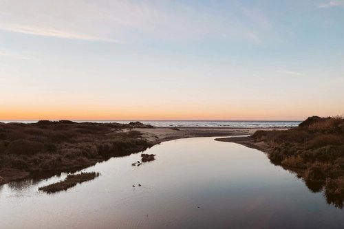Where the creek meets the ocean.