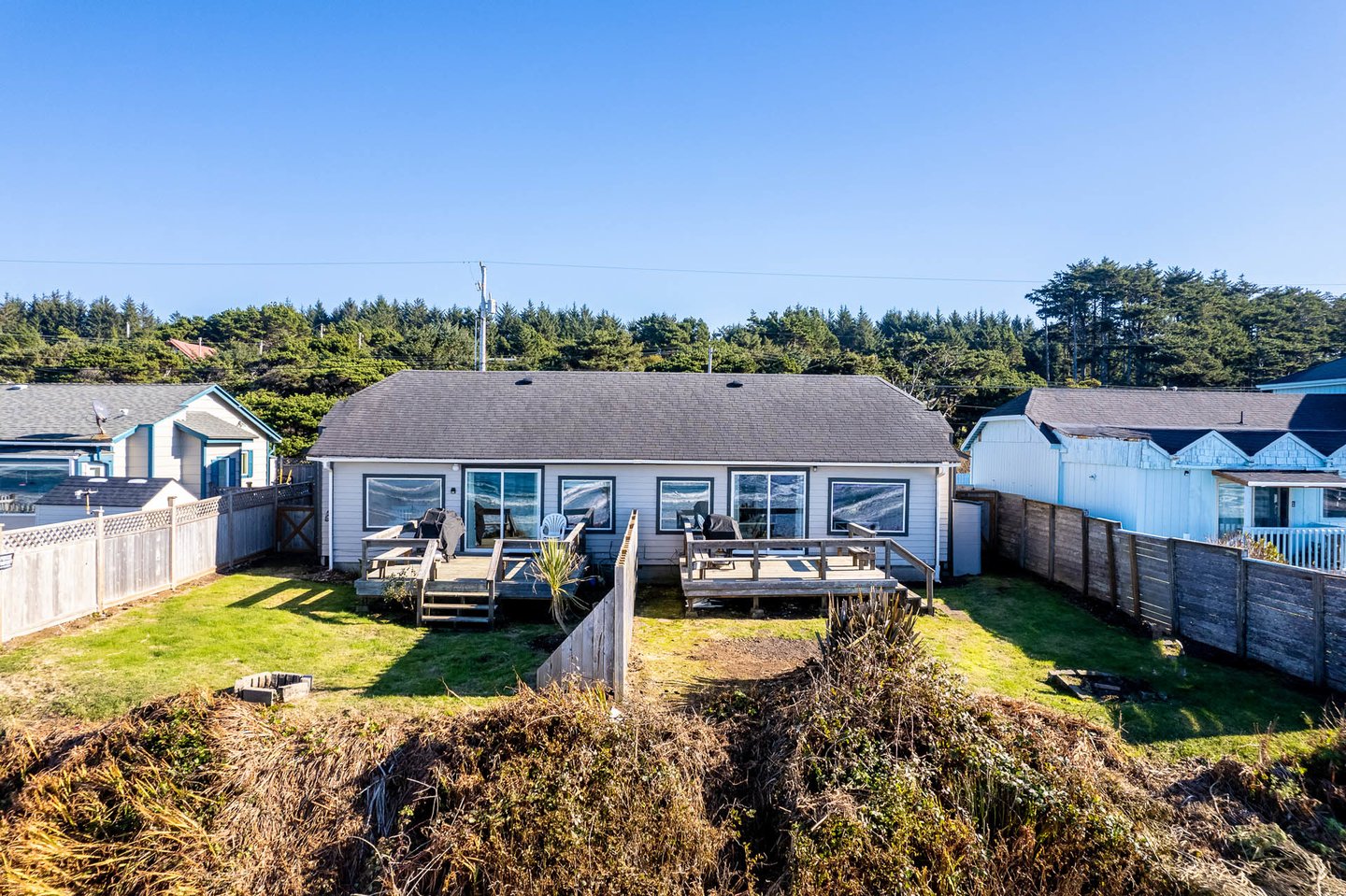 Ocean front duplex with a yard!