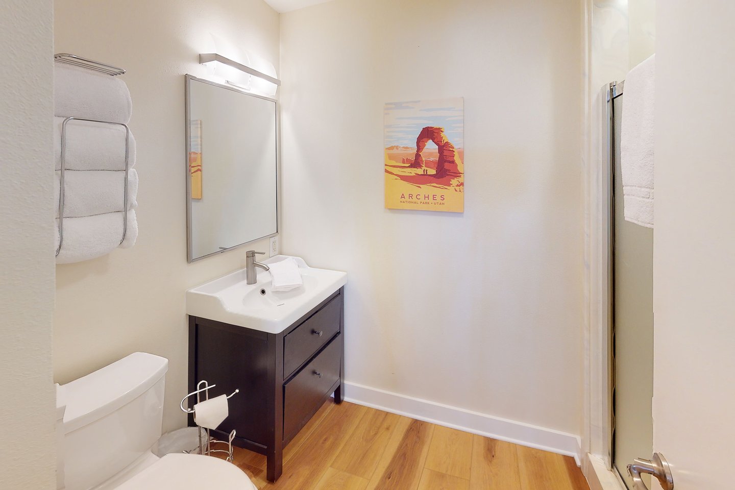 Spacious bath with walk in shower.