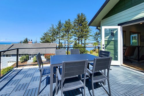 Open the door to enjoy the deck off of the kitchen.
