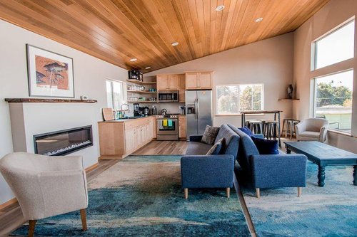 Relax by the fireplace in the Redwood Commons