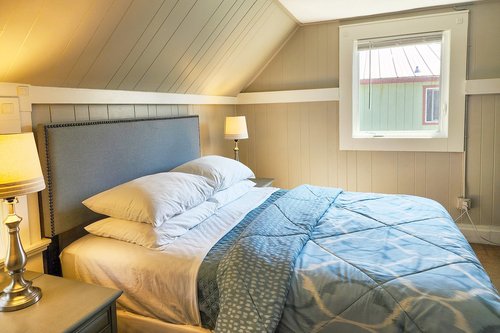 Light and airy bedroom on the upper floor.