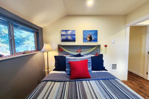 Cozy queen bed.